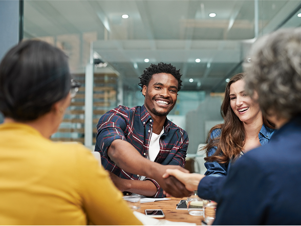Colleagues collaborating with a client